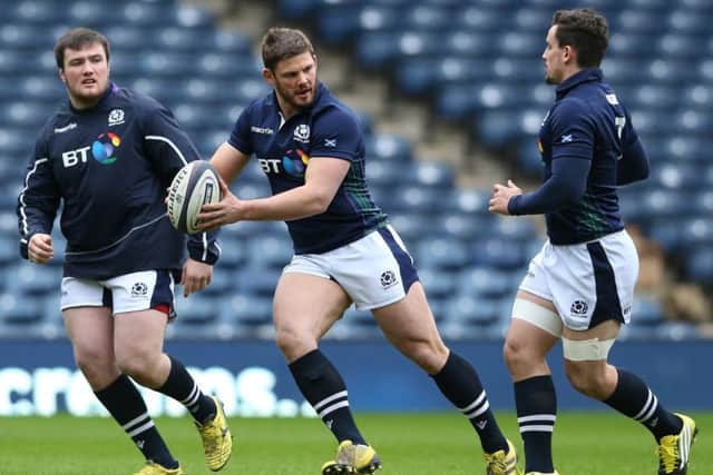 Ross Ford runs with the ball during the Scotland captain's run at Murrayfield Stadium.  Picture: David Rogers/Getty Images