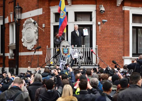 WikiLeaks founder Julian Assange speaks from the balcony of the Ecuadorian Embassy last week. Picture: Dominic Lipinski/PA