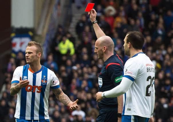 Kilmarnock's Kallum Higginbotham  receives a straight red card for a rash challenge on James Tavernier of Rangers. Picture: Rob Casey/SNS