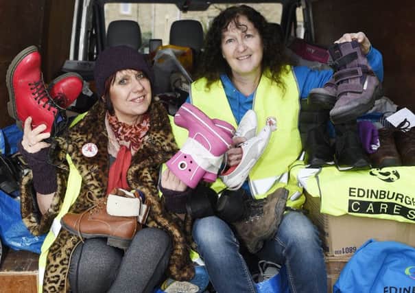 Fay Fife from The Rezillos is working with Lorraine O'Sullivan from Step In My Shoes to collect footwear to donate to Syrian refugees.  Picture: Greg Macvean