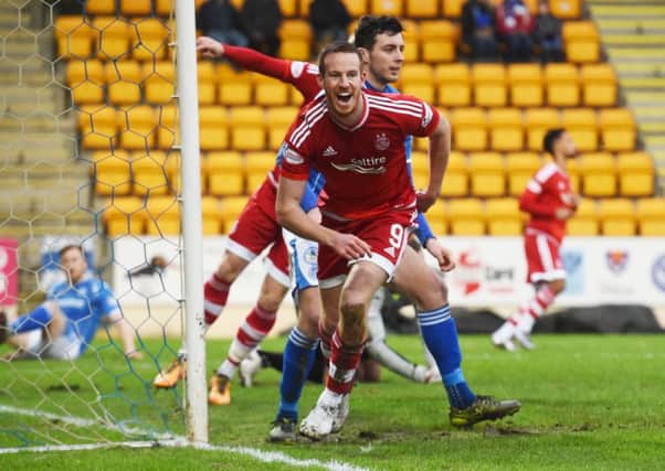 Aberdeen's Adam Rooney celebrates the first goal of the game. Picture: Craig Foy/SNS