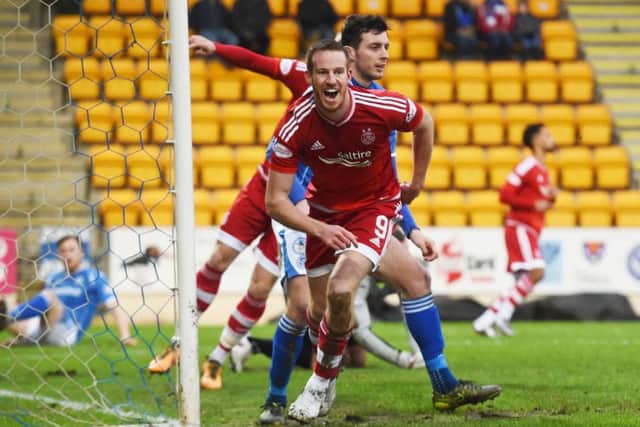 Aberdeen's Adam Rooney celebrates the first goal of the game. Picture: Craig Foy/SNS
