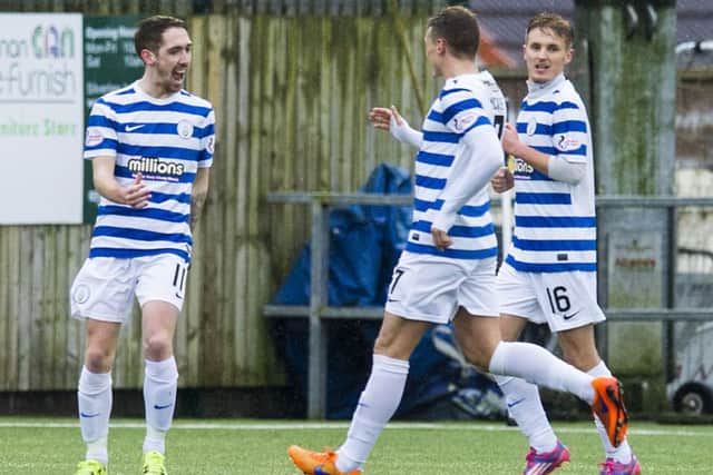 Morton's hat-trick hero Stefan McCluskey, left, celebrates with team mates. Picture: Craig Williamson/SNS