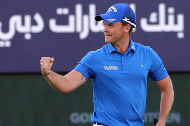 Englands Danny Willett punches the air in triumph as he holes a 12-foot birdie putt to win. Picture: Getty