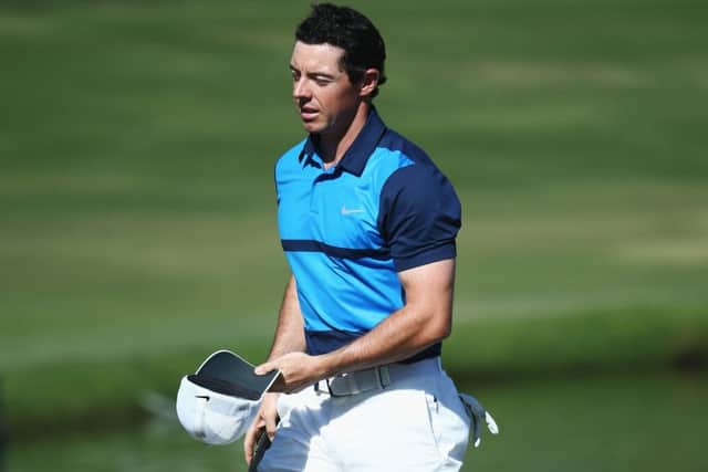 Rory McIlroy leaves the 18th green after shooting a 65 in the final round of the Dubai Desert Classic at the Emirates Golf Club. Picture: Warren Little/Getty Images