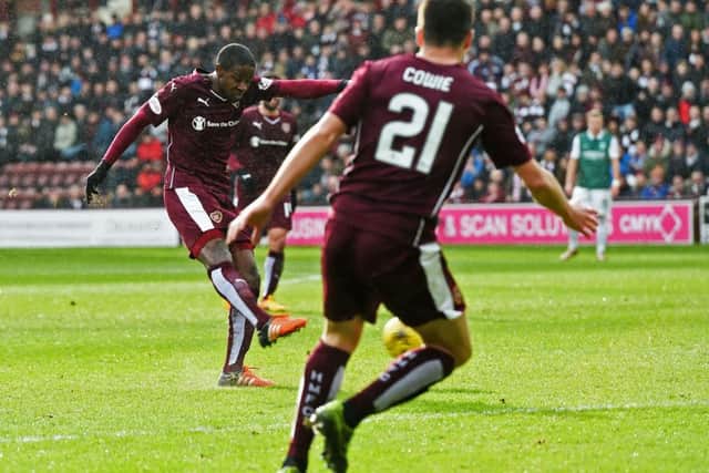 Hearts' Arnauld Djoum strikes to score his side's opener. Picture: SNS