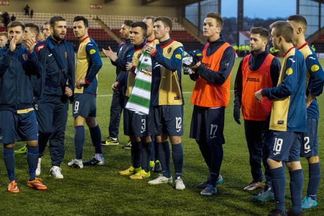 The East Kilbride players applaud their fans at full-time. Picture: SNS