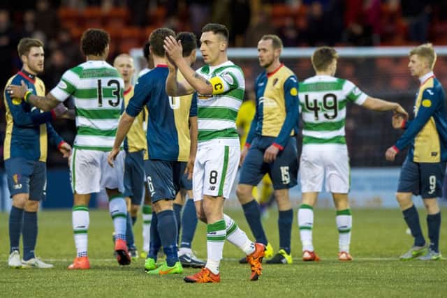 Celtic captain Scott Brown applauds the fans at full-time. Picture: SNS