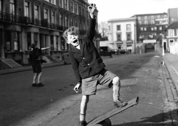 With few cars and wide open spaces, the street was a perfect playground back in the day. Picture: Getty Images