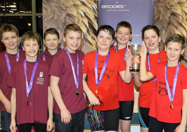 Crathes Primary School swimmers, with the cup.
