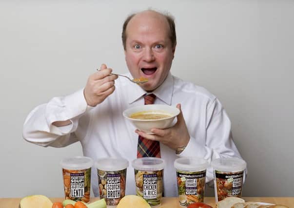 David Sword with the Scottish Soup Company's range that will be stocked by Tesco. Picture: Dominic Cocozza