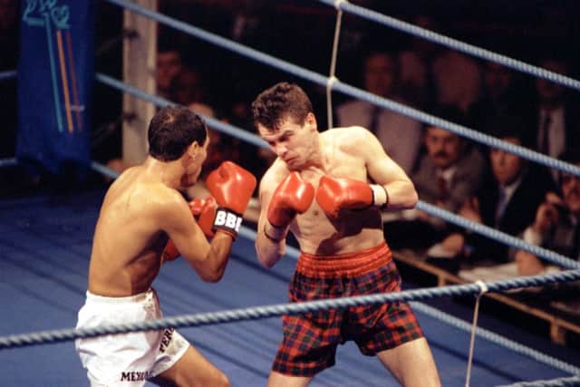 Scottish boxer Pat Clinton in action against Mexican Isidro Perez in a WBO world flyweight title at Glasgow's Kelvin Hall in March 1992. Picture: Jeff Mitchell