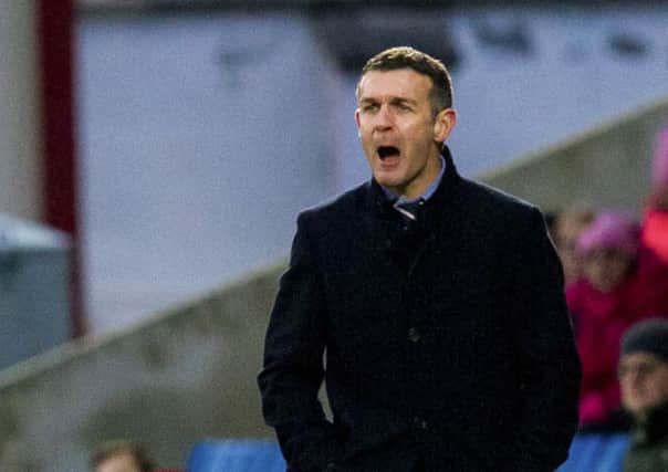 Ross County manager Jim McIntyre roars encouragement during his side's win over Linlithgow Rose. Picture: SNS