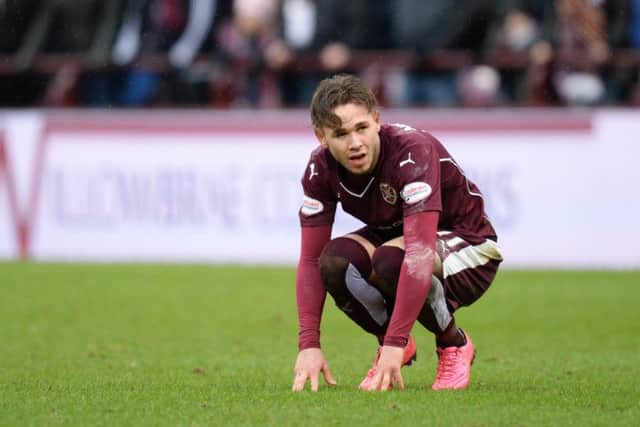 Hearts' Sam Nicholson looks dejected at full time in Sunday's Edinburgh derby. Picture: SNS