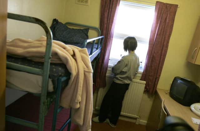 A female prisoner in a cell at Cornton Vale, which will close in the summer. Picture: PA