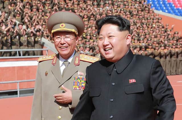 President Kim Jong-un enjoys a military parade in the North Korean capital Pyongyang. Picture: AFP