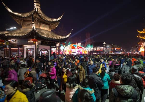 As China celebrates the Year of the Monkey, the country's slowing economy is weighing on UK growth hopes. Picture: ChinaFotoPress via Getty Images