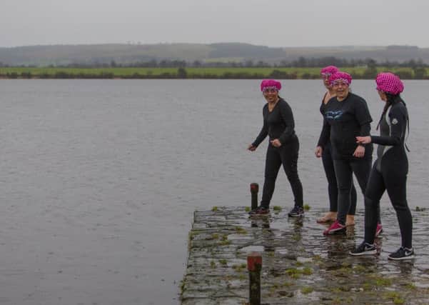 If you'd rather not host a dress-down Friday in the office, you could always raise money by jumping into a wintry Loch Leven like these Holiday Inn Express Glenrothes staff did. Image: Steven Brown