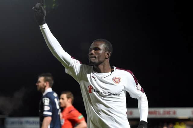 Hearts striker Abiola Dauda celebrates after scoring the first of his two goals against Ross County. Picture: SNS