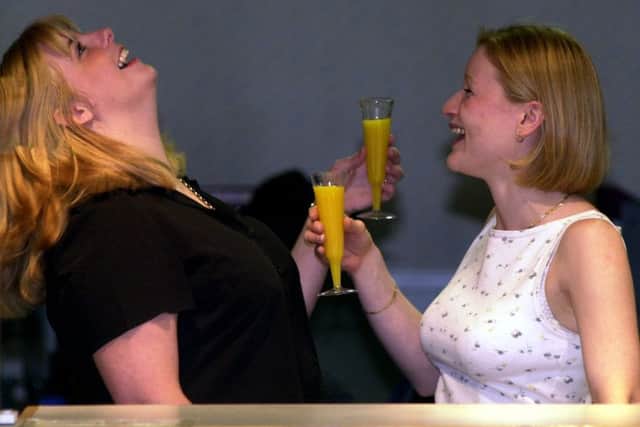 Two ladies enjoying a drink