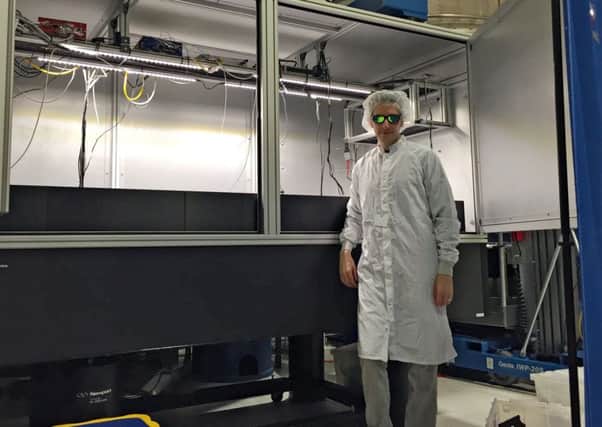 Alastair Heptonstall working on the LIGO project. Picture: supplied