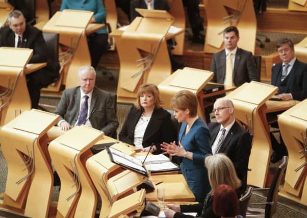Nicola Sturgeon at First Ministers Questions at the Scottish Parliament yesterday. Picture: PA