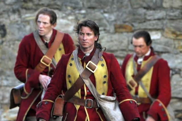 Actors film scenes from the hit TV series Outlander