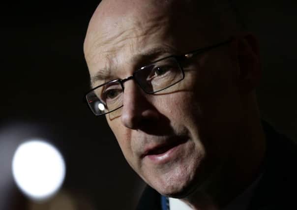 Finance minister John Swinney and the SNP government are already making decisions on tax and spending. Picture: PA
