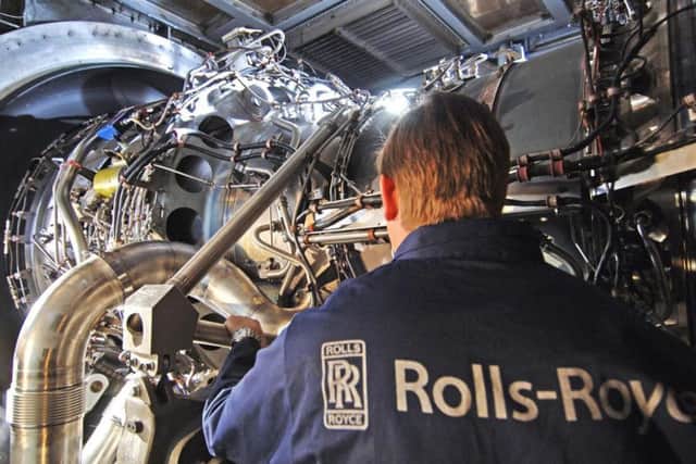 Rolls-Royce has slashed its dividend after suffering a drop in profits. Picture: Rolls Royce/PA Wire