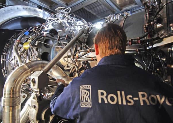 Rolls-Royce has slashed its dividend after suffering a drop in profits. Picture: Rolls Royce/PA Wire