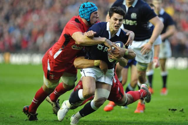 Justin Tipuric and Taulupe Faletau bring down Sam Hidalgo-Clyne short of the try line in last year's meeting. Picture: Ian Rutherford
