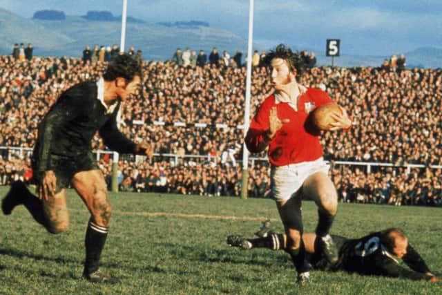 Williams in full flow as he takes on the All Blacks flanker Ian Kirkpatrick in 1971. Picture: Getty Images