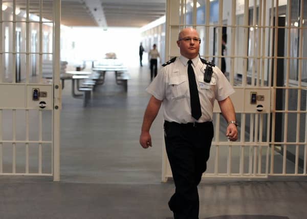 In Low Moss Prison in Bishopbriggs, men serving long sentences are taught how to be better fathers through baby massage classes and under-fives play sessions. Picture: Ian Rutherford