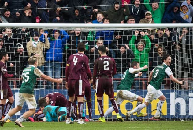 Paul Hanlon's late goal secured a Scottish Cup replay for Hibs. Picture: Rob Casey/SNS