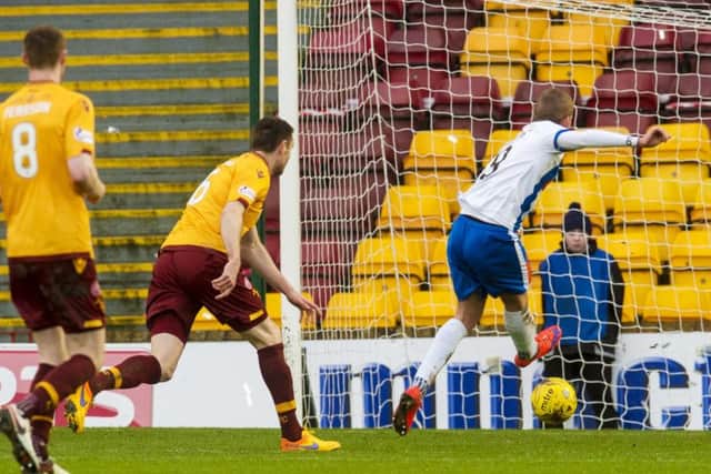 Kilmarnock's Craig Slater (right) scores the second goal.