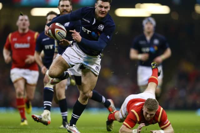 Duncan Taylor wrong foots Gareth Anscombe of Wales to score Scotland's second try but it was not enough.  Picture: Michael Steele/Getty Images