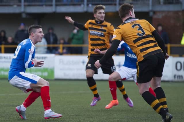 Michael O'Halloran (left) scores to equalise for Rangers. Picture: SNS Group