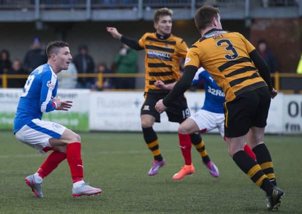 Michael O'Halloran (left) scores to equalise for Rangers. Picture: SNS Group
