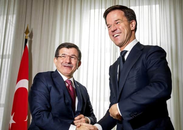 Turkish prime minister Ahmet Davutoglu, left, met his Dutch counterpart Mark Rutte in The Hague for talks last week. Picture: AFP/Getty Images