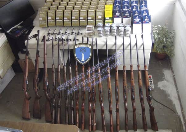 Rifles and bullets confiscated following the arrest of two British citizens at the northern town of Alexandroupolis. Picture: AP