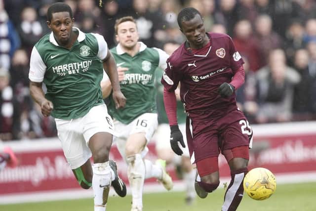 Hearts' Abiola Dauda (right) in action against Hibs' Marvin Bartley in the Scottish Cup 5th Round tie at Tynecastle.
Picture: Greg Macvean