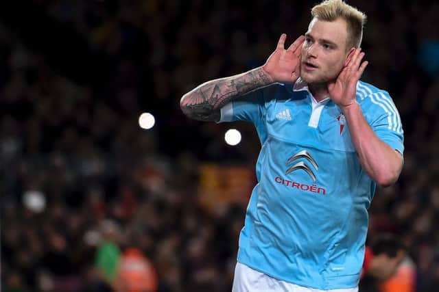 Former Celtic striker John Guidetti scored a penalty to level the scoreline before Barca got into gear. Picture: AFP/Getty Images