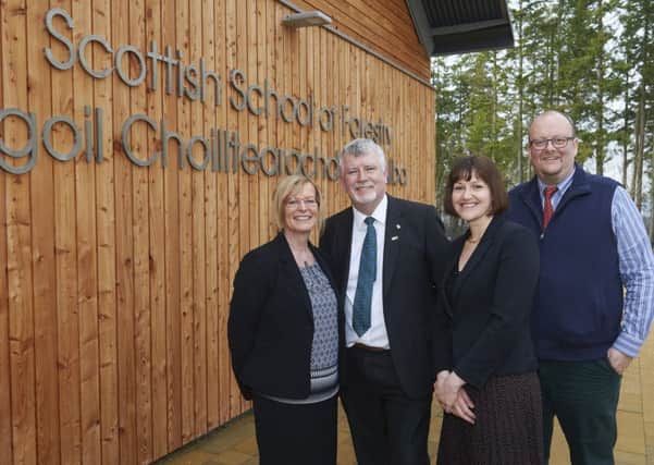 New forestry school is opened by by Ian Ross OBE, pictured with Diane Rawlinson, Inverness College UHI Principal. Also pictured are Liz Barron-Majerik and Prof James Pendlebury.