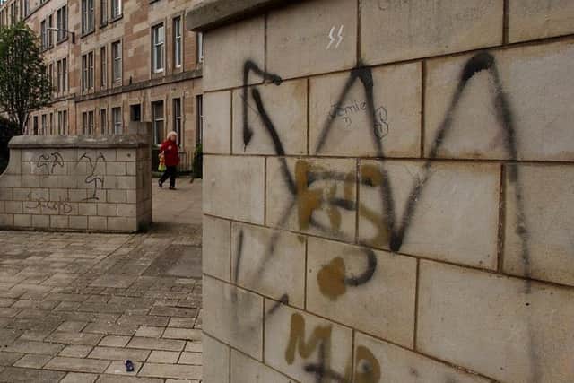 Gang graffiti in Buchanan Street, Leith