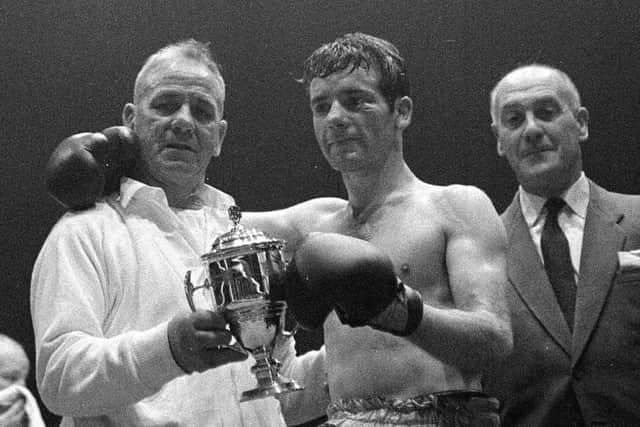 Walter McGowan with the Empire Champion Cup at Paisley Ice Rink in September 1963. Picture: Scotsman Publications