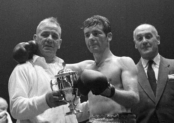 Walter McGowan with the Empire Champion Cup at Paisley Ice Rink in September 1963. Picture: Scotsman Publications