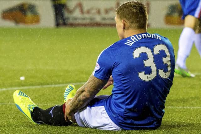 Rangers' Martyn Waghorn injured his knee shortly after scoring the opening goal. Picture: SNS