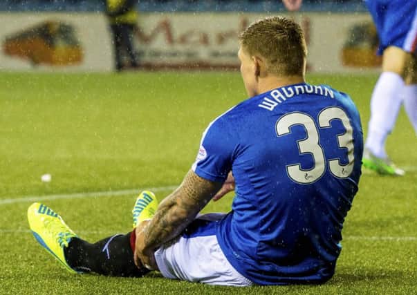 Rangers' Martyn Waghorn injured his knee shortly after scoring the opening goal. Picture: SNS