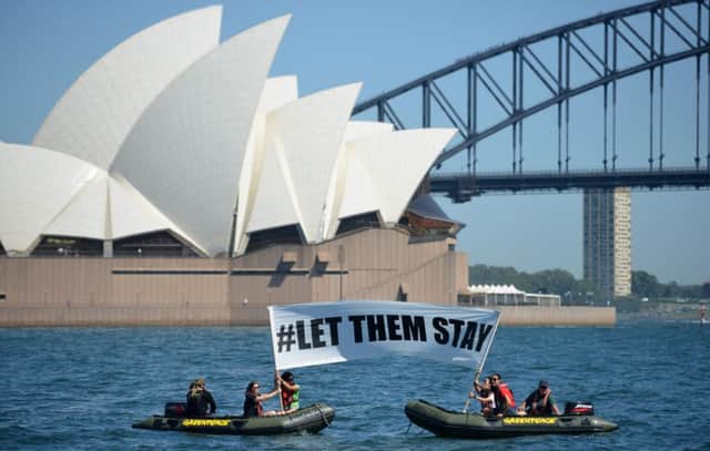 Greenpeace protesters in front of Sydney Opera House. Picture: Getty Images