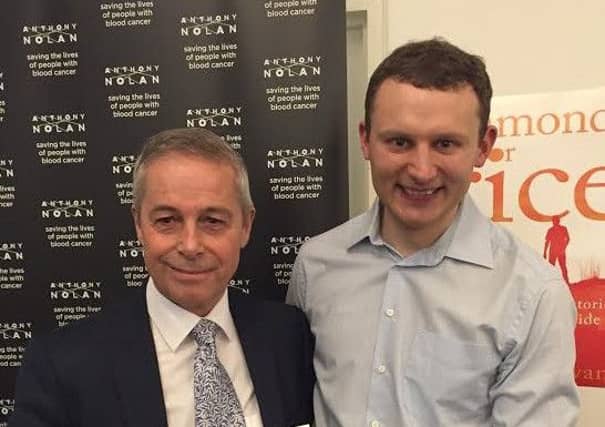 Eric Evans (left) with his "hero" bone marrow donor Axel Drewes